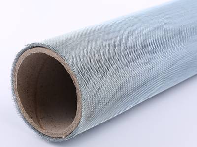 A roll of bluish galvanized mesh on the white background.